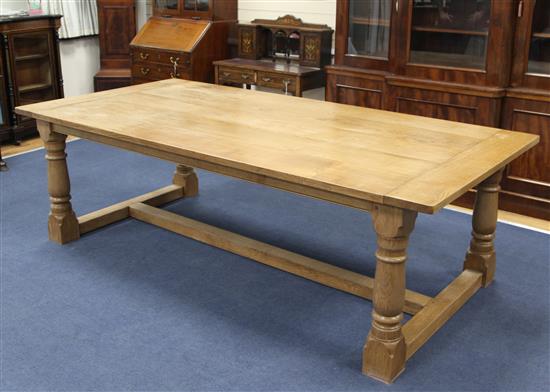 A large 17th century style oak refectory table, 8ft x 3ft 11in.